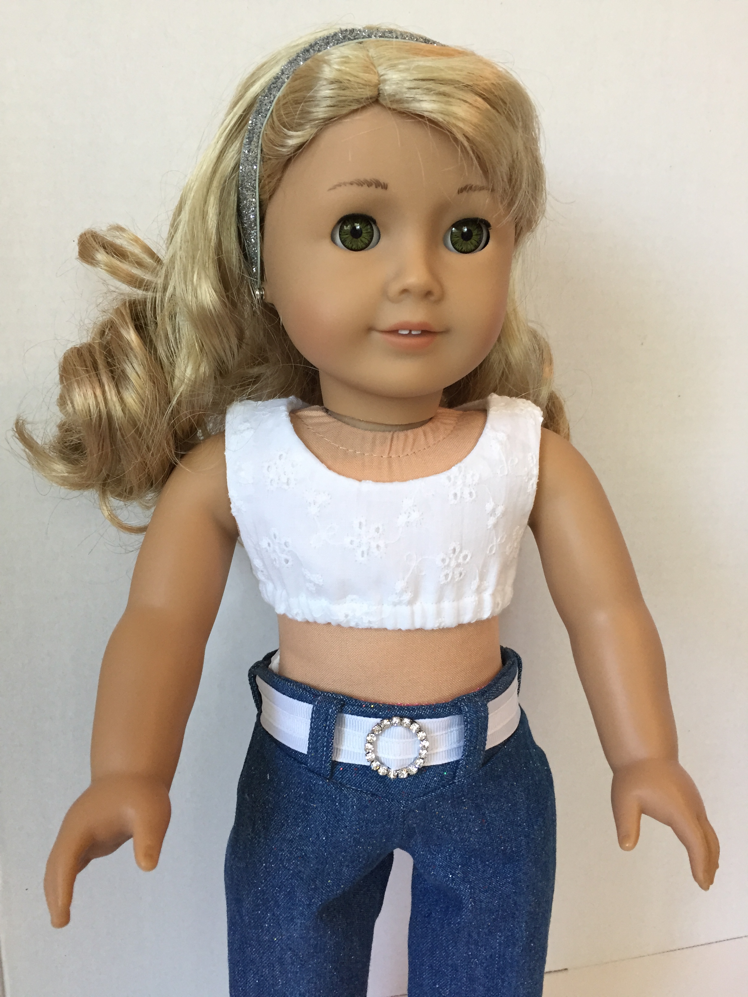 Make a cute midriff crop top for 18 inch dolls with the easy Popsicle Top PDF sewing pattern by OhSewKat.