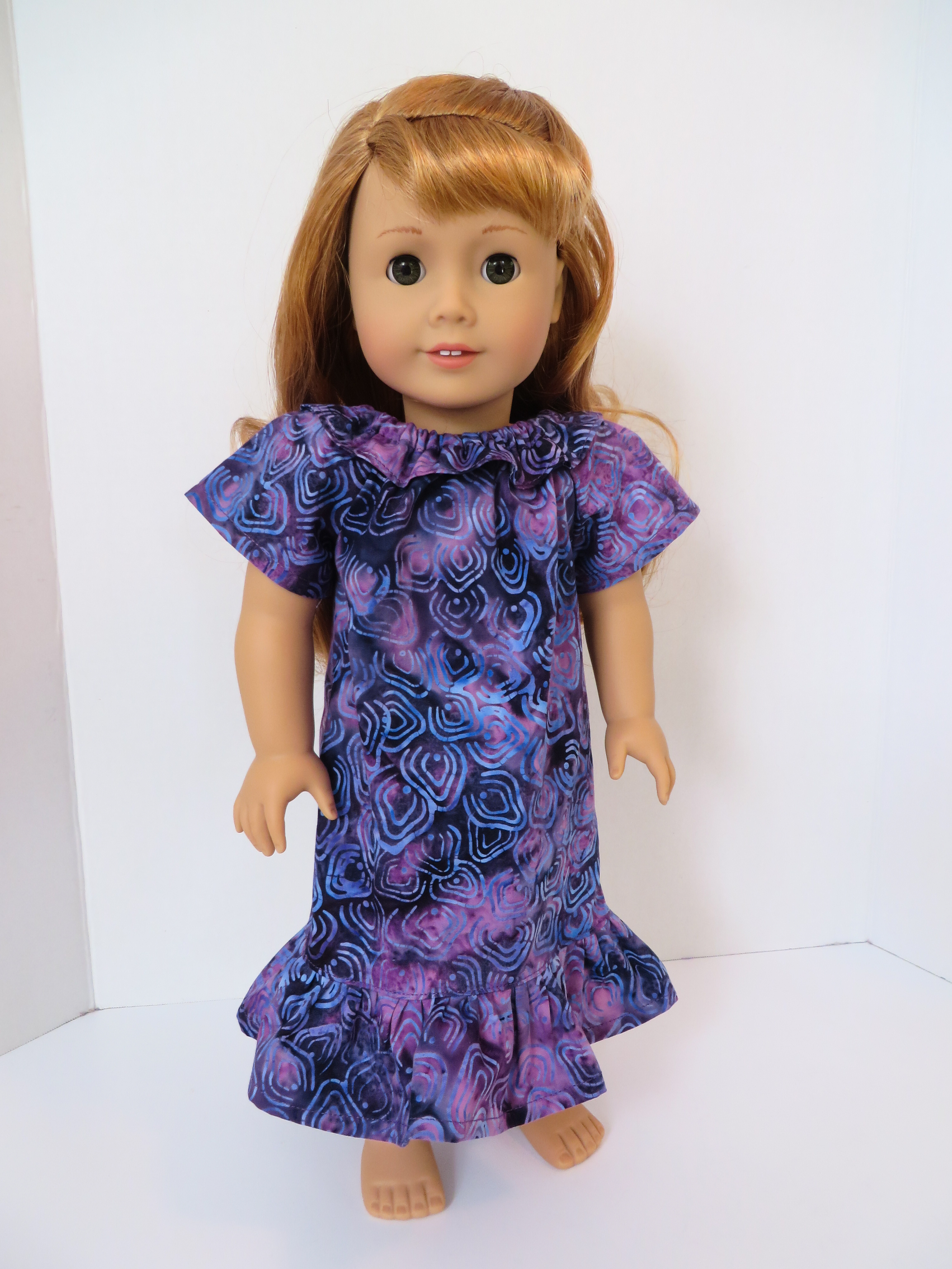 Make an easy, Hawaiian inspired MuuMuu doll dress for your 18 inch doll like Nanea. Easy Playtime Peasant Top sewing pattern tutorial by Oh Sew Kat! Visit www.ohsewkat.com for a free trial skirt pattern. #nanea #ohsewkat #sewingpattern #dollclothes #easy
