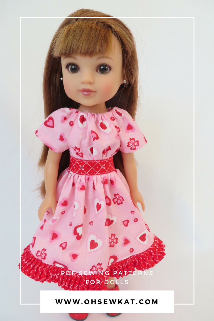 Hearts for hearts doll wearing a pink valentine dress with hearts