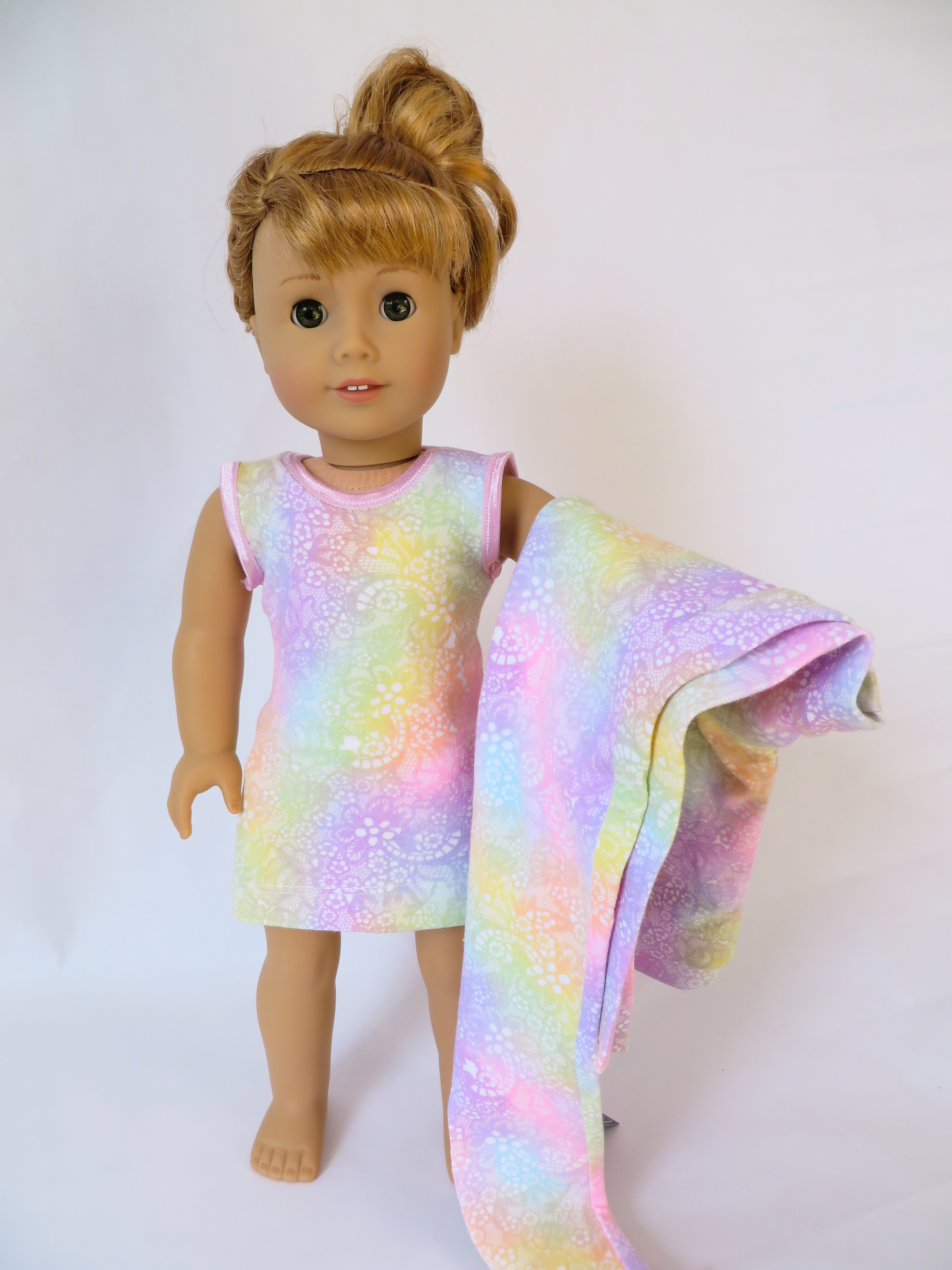 Make a tee shirt dress from a tee shirt pattern hack by Oh Sew Kat! Make American Girl Doll Clothes with easy sewing PDF patterns from Oh Sew Kat! Blog with craft tutorials and free skirt pattern. #ohsewkat #dollclothes #dress #18inchdolls #sewing