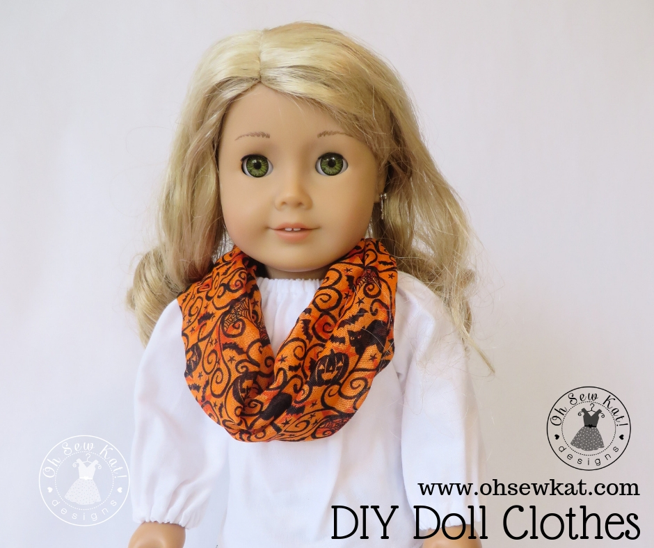 How to make an infinity scarf for your doll with Dollar Tree Supplies. Visit www.ohsewkat.com to try a free doll clothes sewing pattern. #dollclothes #sewingpattern #ohsewkat #craft #tutorial #18inchdolls