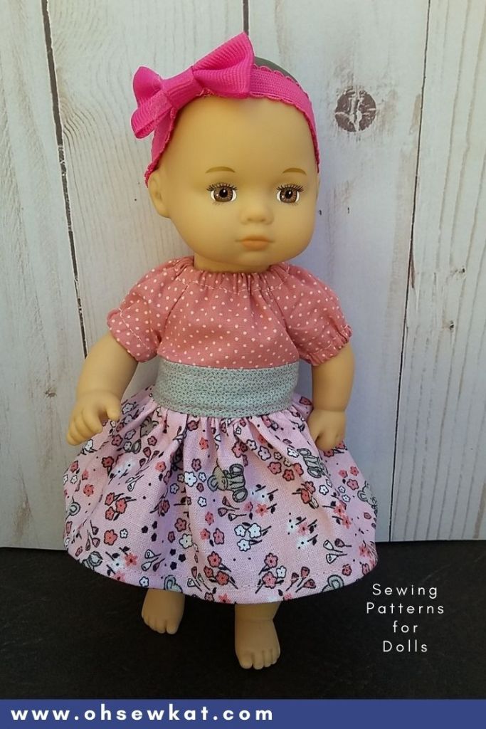 Sew for your 8 inch Caring for Baby Doll from American Girl. The Party Time Peasant Dress pattern is tiny but easy to sew with just a few scraps from OhSewKat. Find more PDF sewing patterns for dolls like 18 inch American Girl Dolls and Welliewishers.